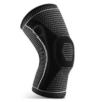 Knæstøtte med sidestivere og silikonestøtte til patella