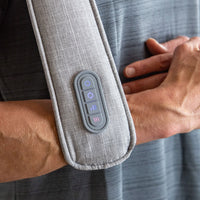 Närbild på knappsatsen på Sharper Image Realtouch med bland annat intensitet och värme